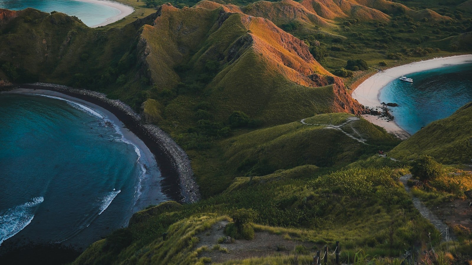 A ridge overlooking three separate bays on Padar Island, representing the wider landscape you survey before choosing a single path